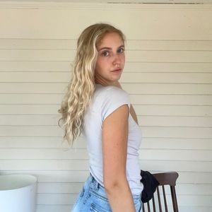 Women’s John Galt baby tee, light blue.